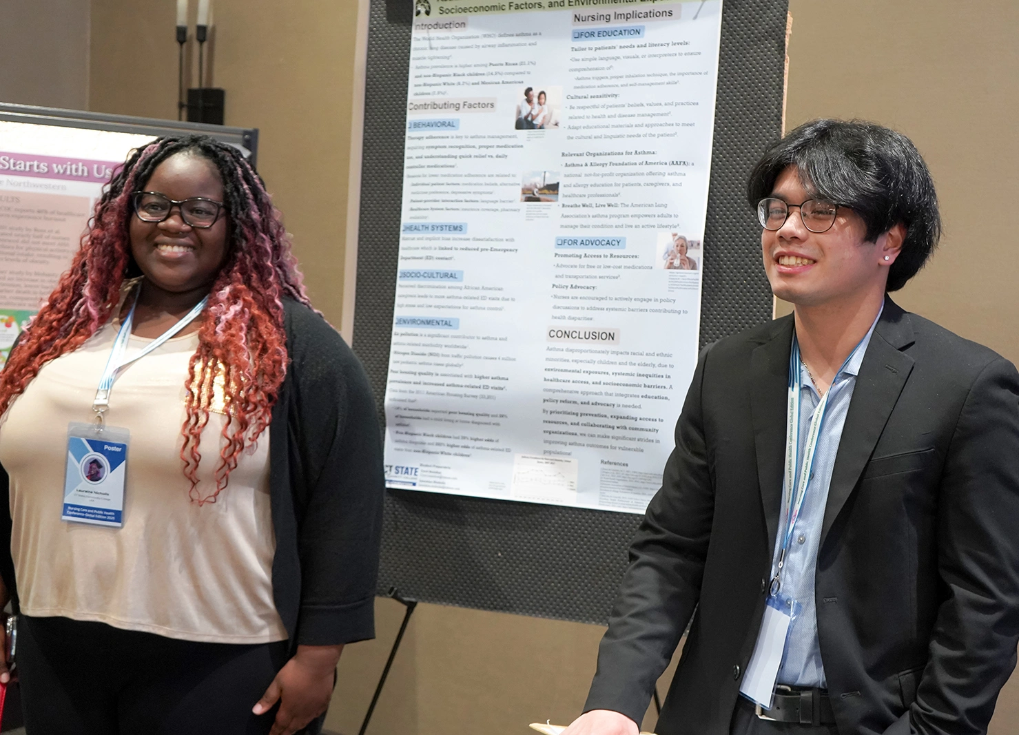 Student presenting poster to a small group